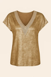 Women's gold blouse with V-neck and foil print short sleeves