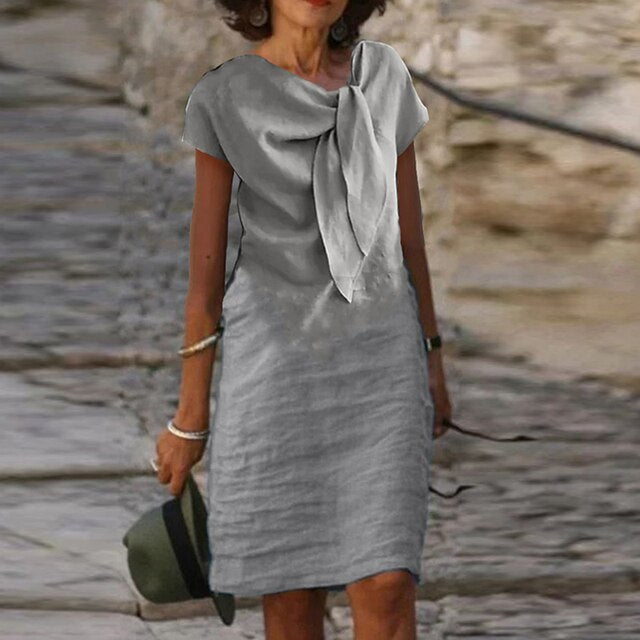 Dames zomerjurk midi met A-lijn en taille accent