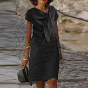 Dames zomerjurk midi met A-lijn en taille accent