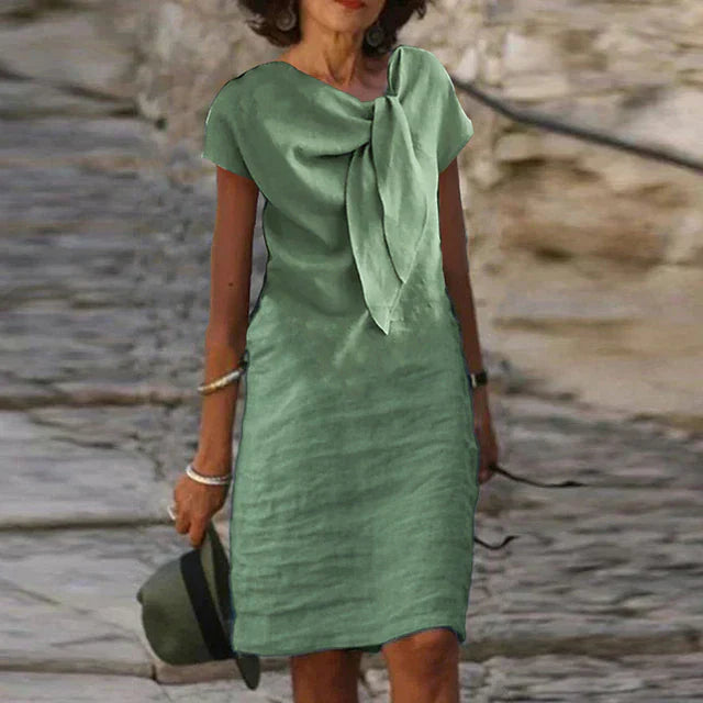 Dames zomerjurk midi met A-lijn en taille accent