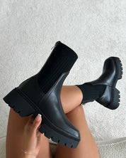 Zwarte dames enkellaarzen met gebreide schacht | Winter sock boots
