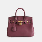 Dames handtas met goudkleurige details