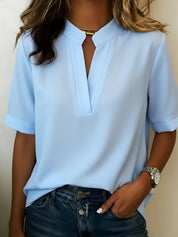 Women's blouse with short sleeves and stand-up collar relaxed fit