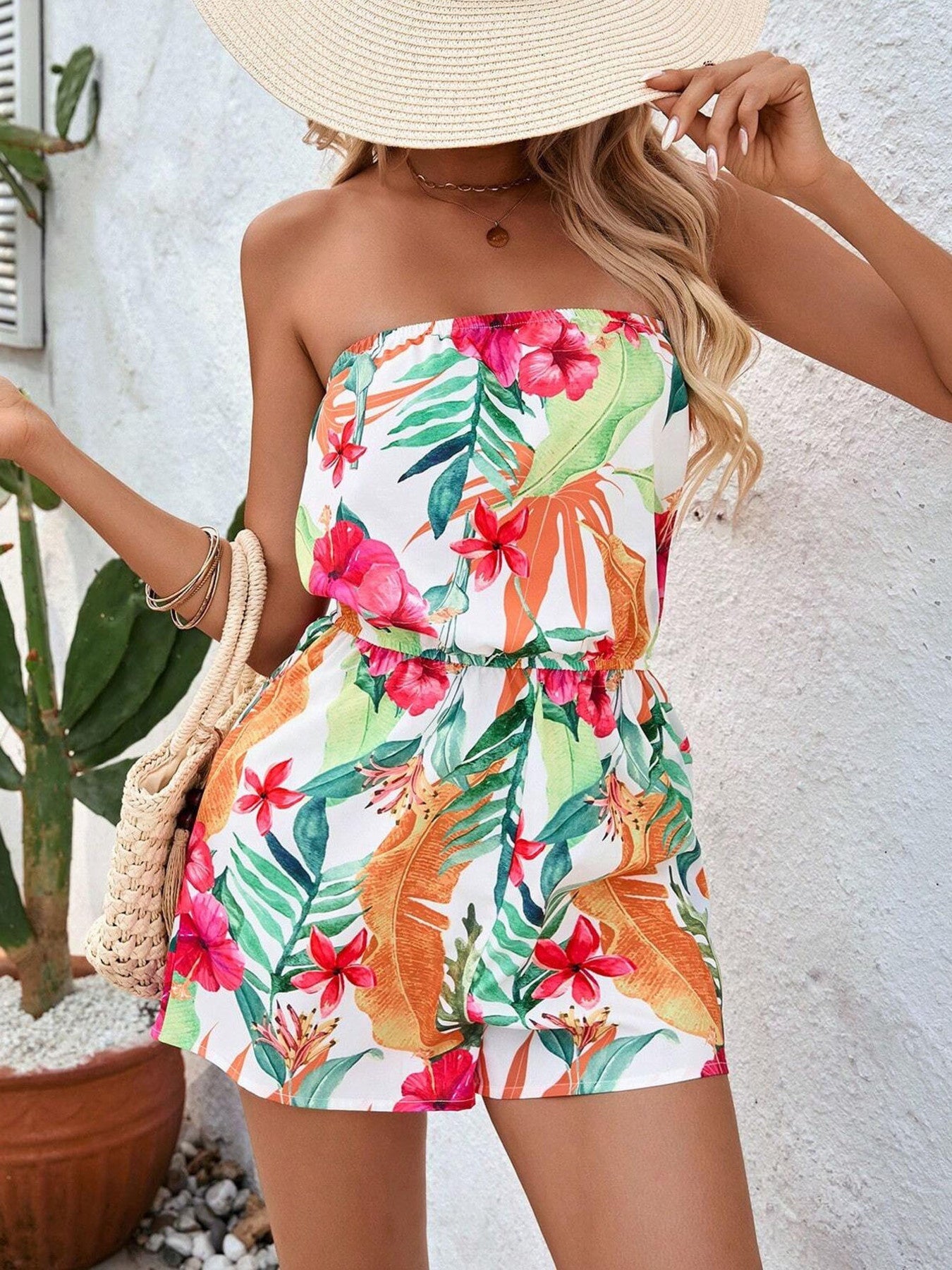 Dames zomer jumpsuit strapless met kort broekje en tropische print