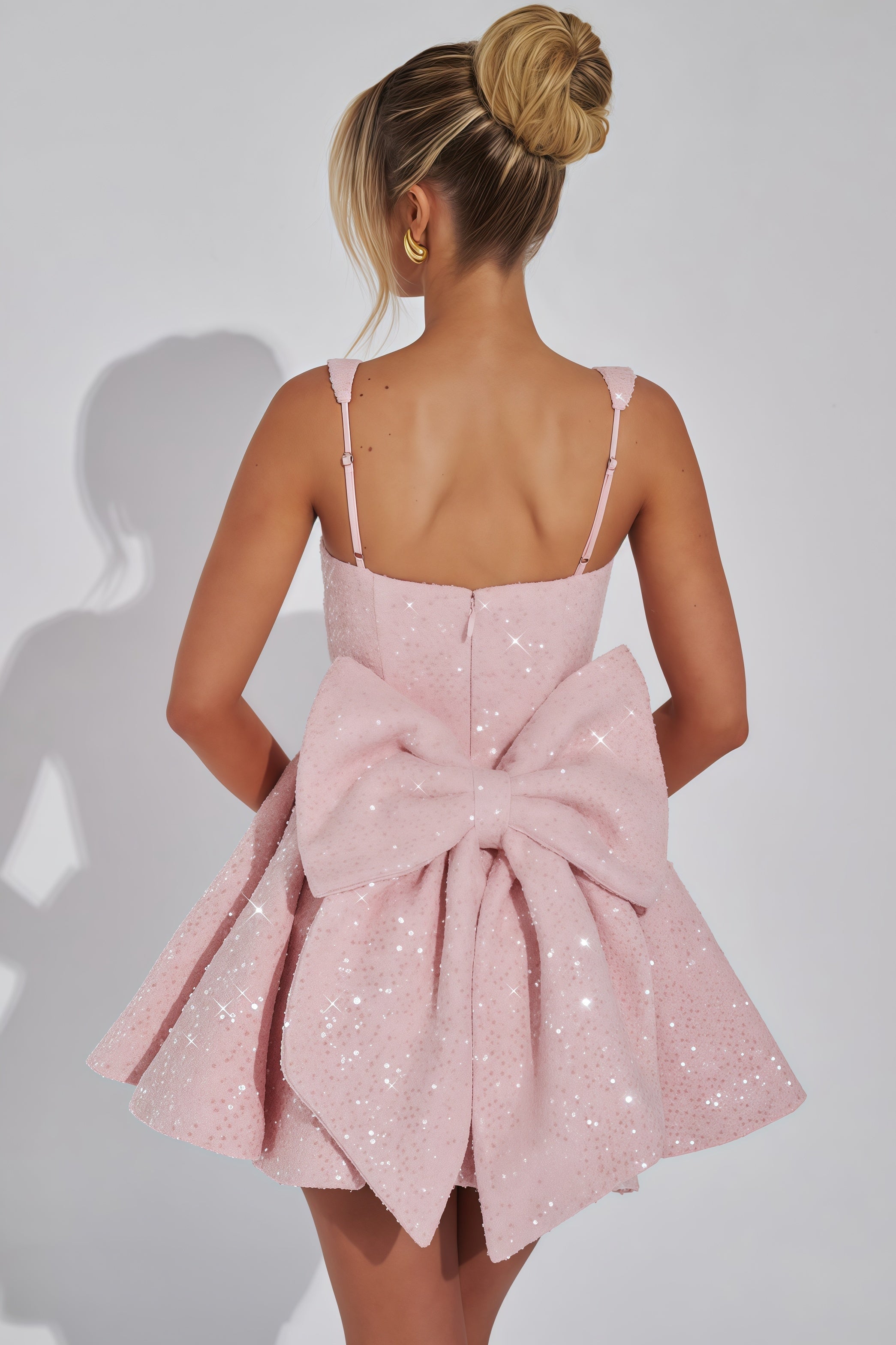 Roze glitter cocktailjurkje | Feestjurk A-lijn met strik