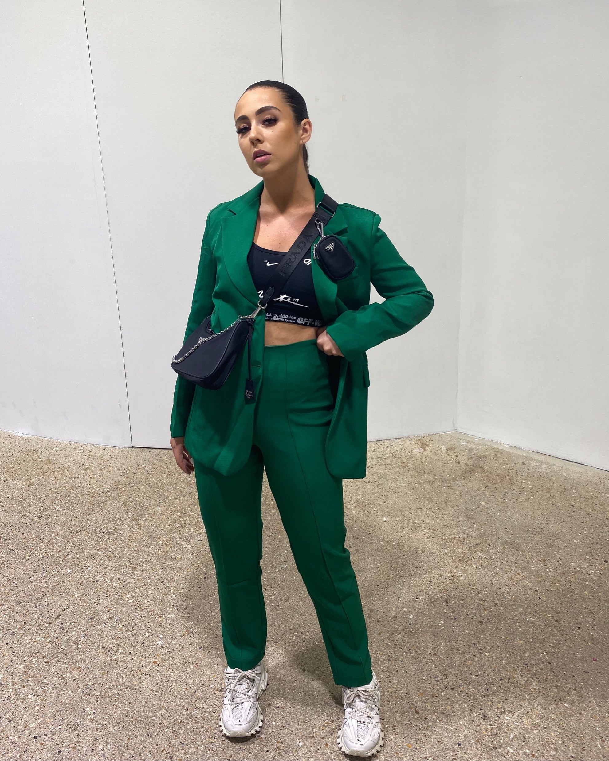 Dames donkergroene blazer en broek set met schoudervulling