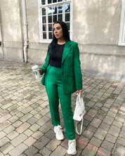 Dames donkergroene blazer en broek set met schoudervulling