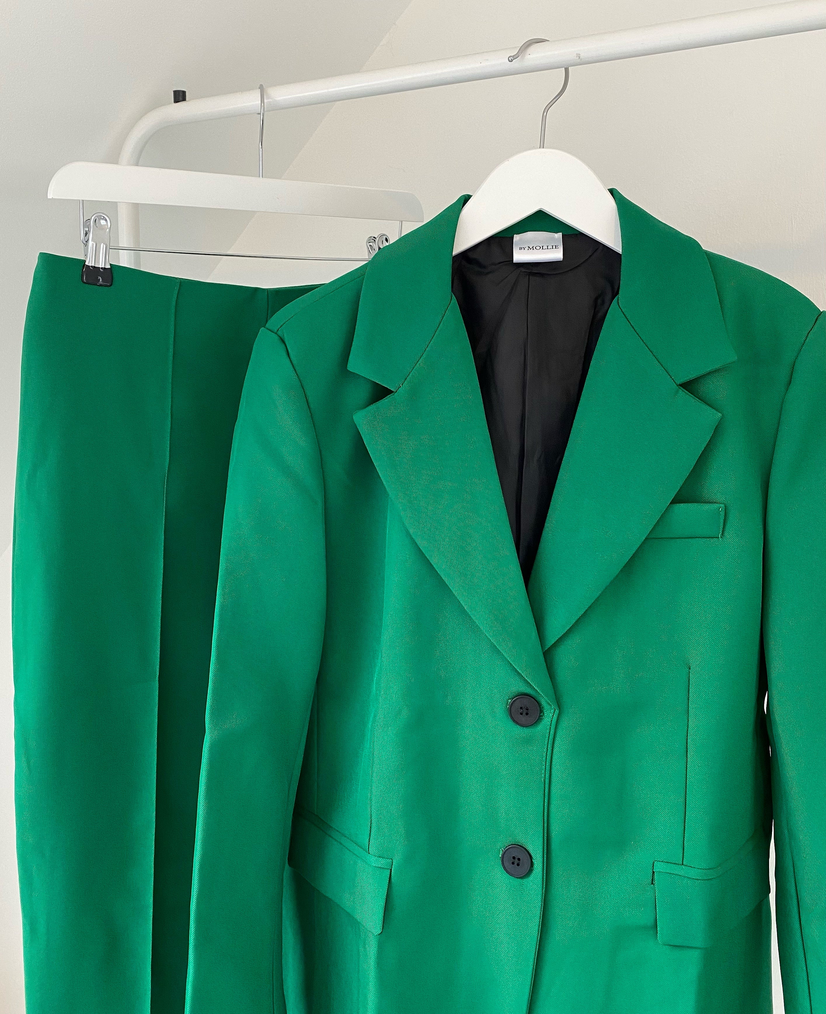 Dames donkergroene blazer en broek set met schoudervulling