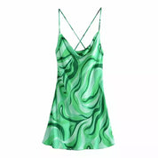 Kort zomerjurkje dames satijn - Kruisbandjes met open rug en groene print