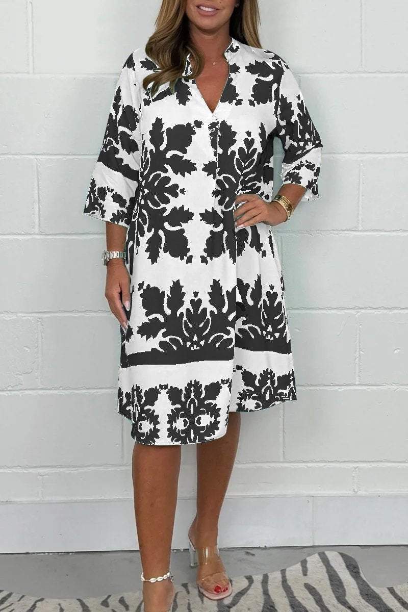 Dames zomerjurk met print - V-hals en lange mouwen