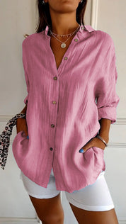 Women's blouse with button closure and classic collar
