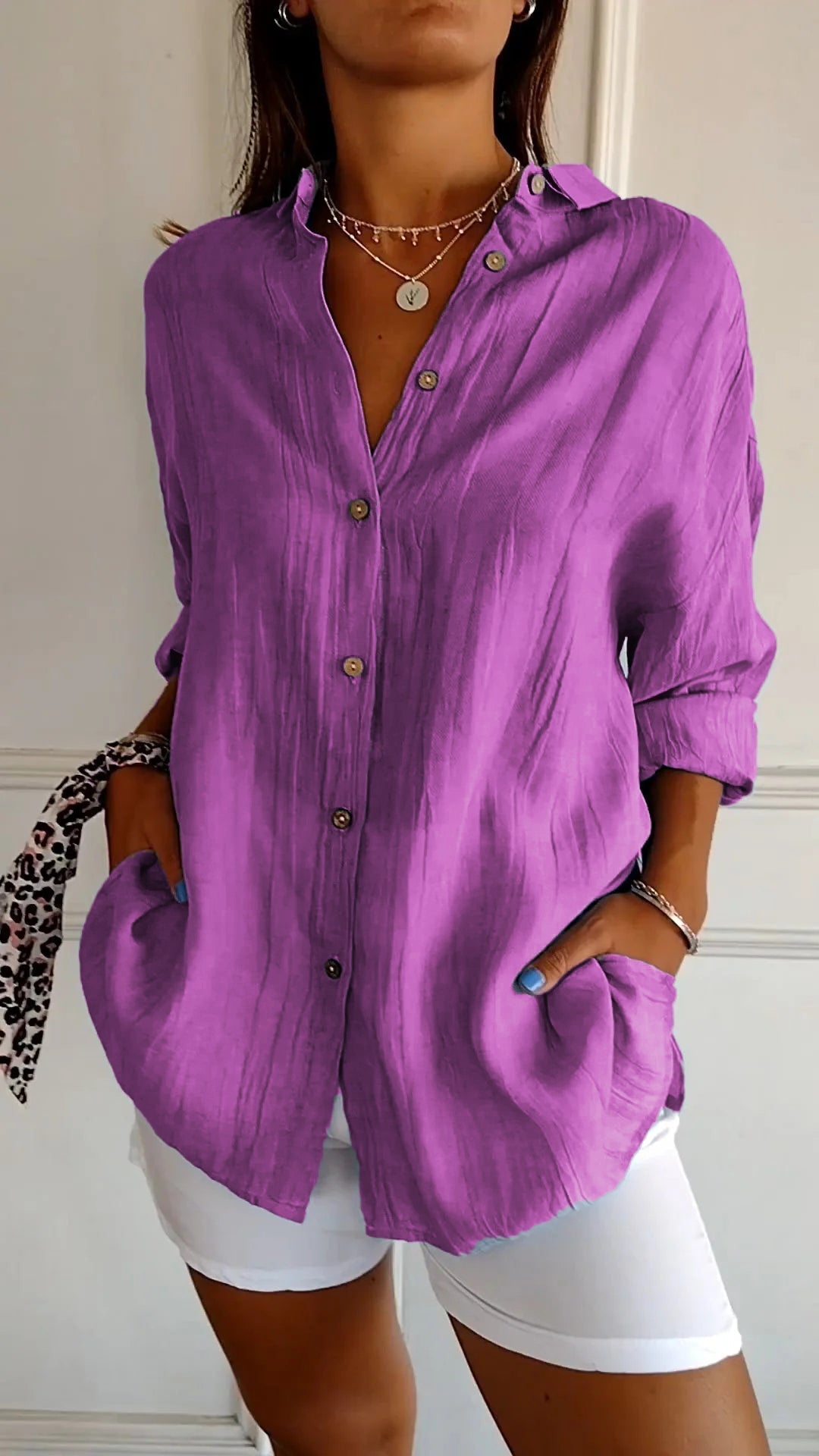 Women's blouse with button closure and classic collar