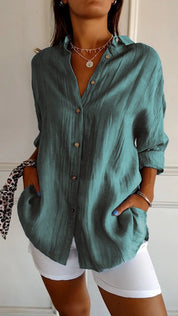 Women's blouse with button closure and classic collar