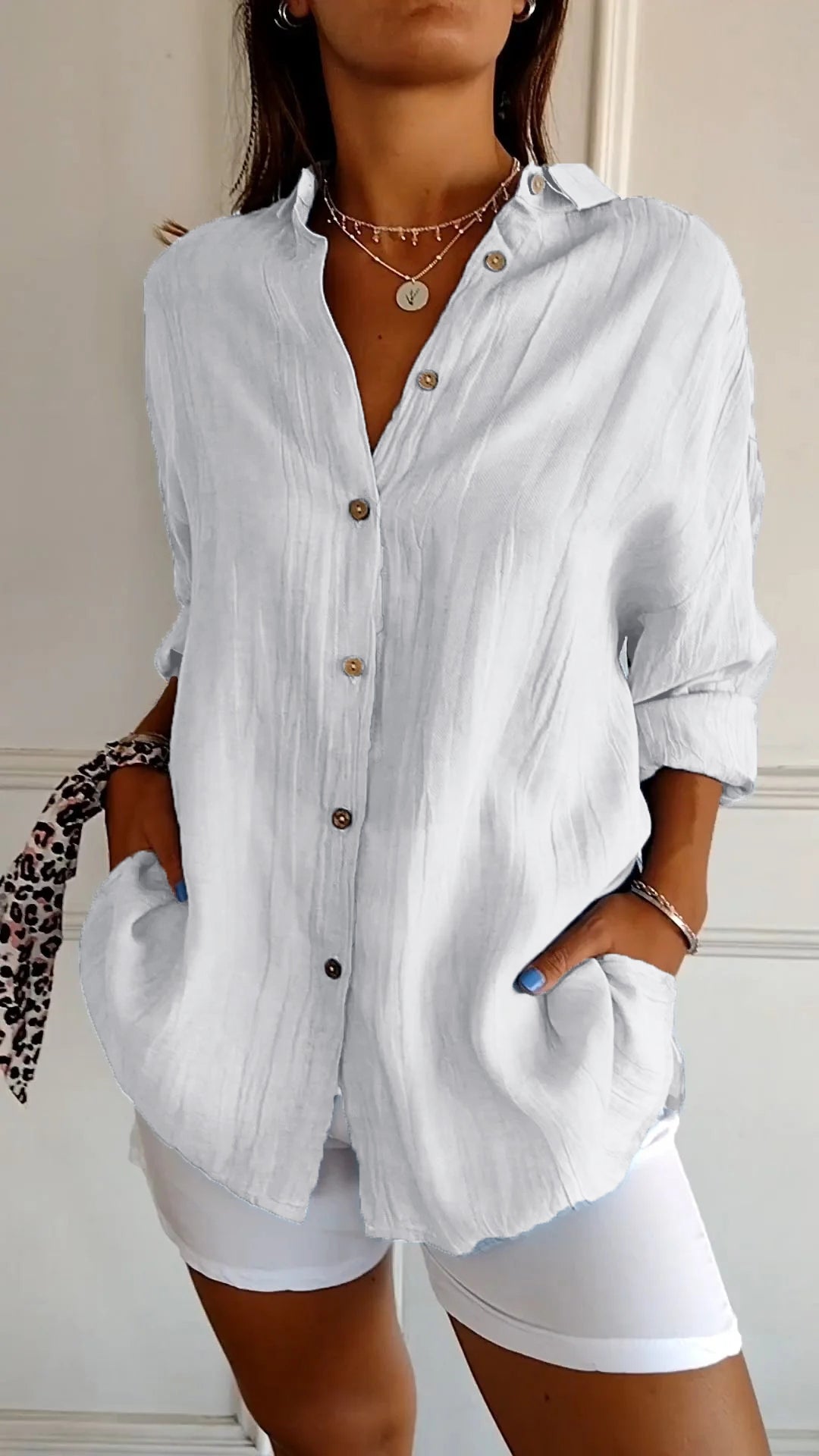 Women's blouse with button closure and classic collar