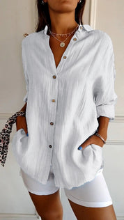 Women's blouse with button closure and classic collar