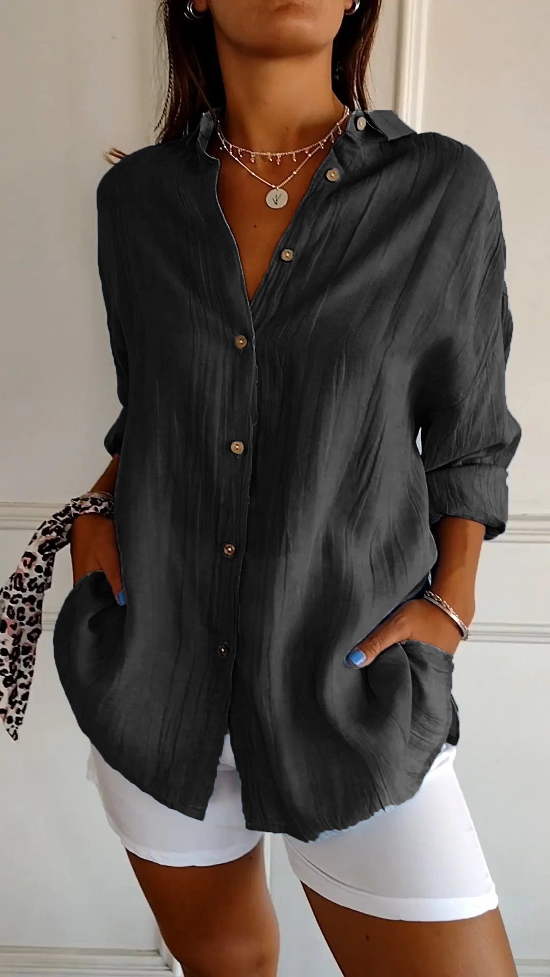 Women's blouse with button closure and classic collar