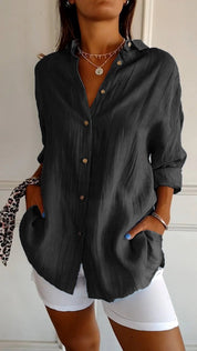 Women's blouse with button closure and classic collar