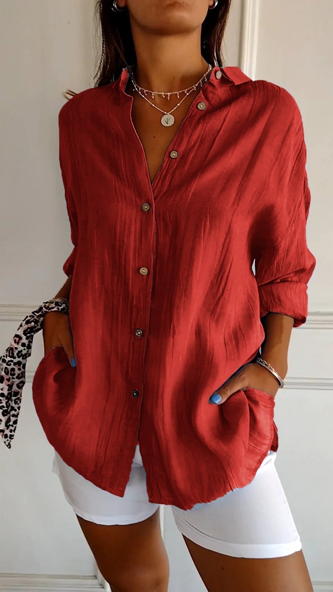 Women's blouse with button closure and classic collar