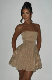 Feestelijke dames glitterjurk | Strapless en kort