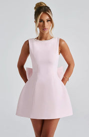 Dames cocktailjurk met strik detail en pareltjes - Avondjurk