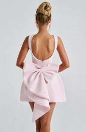 Dames cocktailjurk met strik detail en pareltjes - Avondjurk