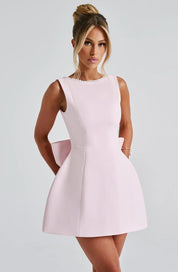 Dames cocktailjurk met strik detail en pareltjes - Avondjurk