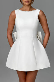 Dames zomerjurk met strik en parels