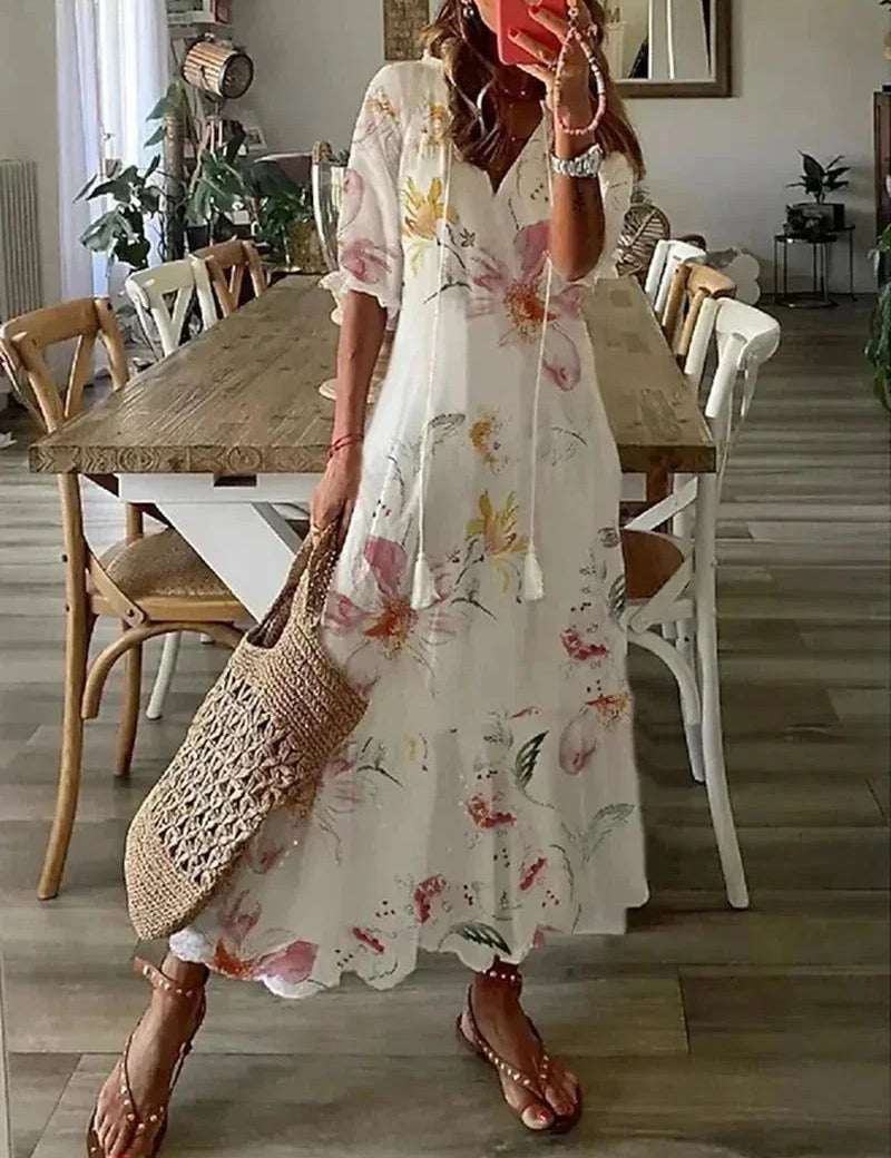 robe-longue-femme-col-en-v-motifs-floraux--7e776_73511d9b-40e9-4c9e-9450-0168c8381ff4.webp