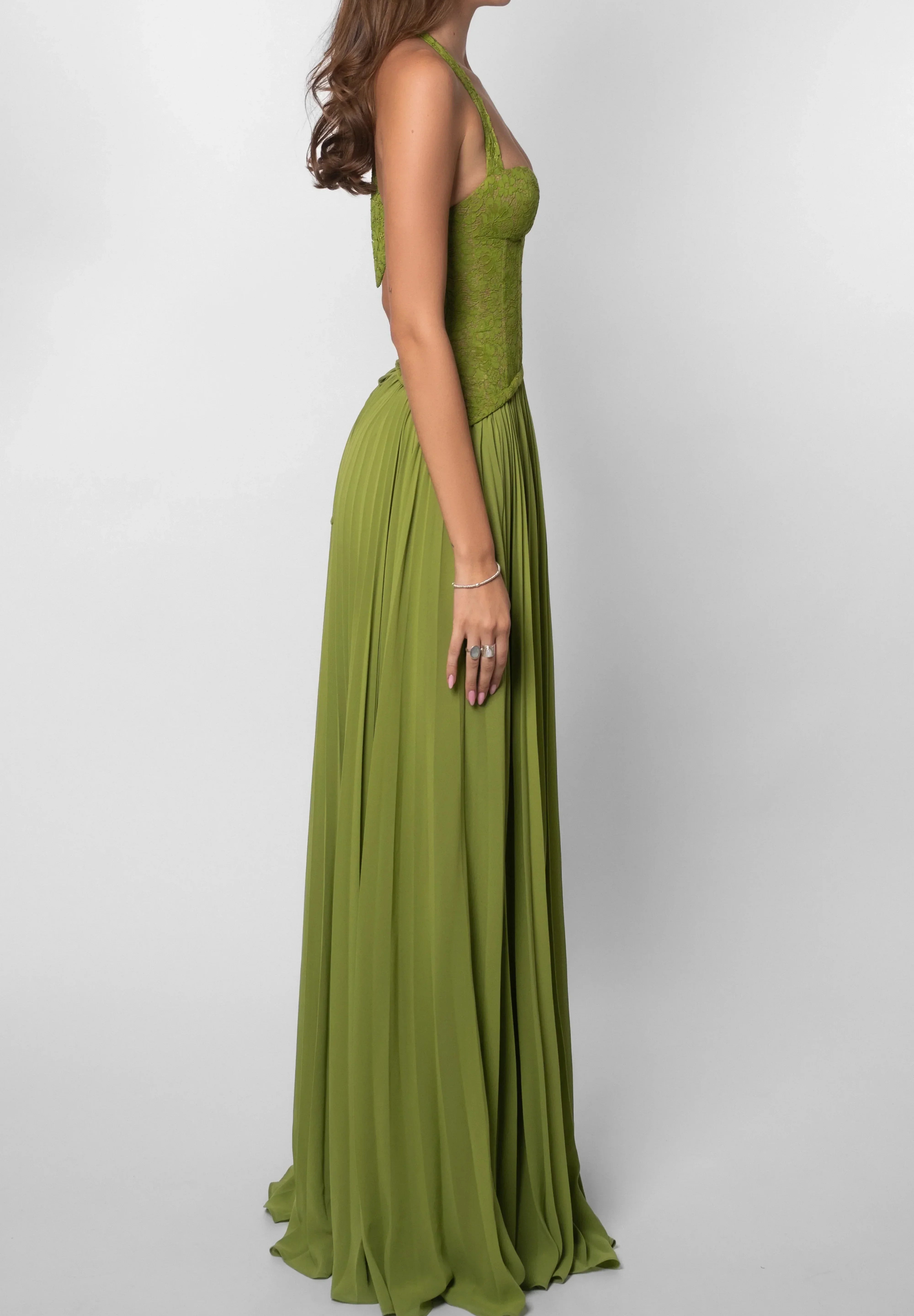 Groene feestjurk dames met corset en geplisseerde rok