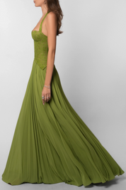 Groene feestjurk dames met corset en geplisseerde rok