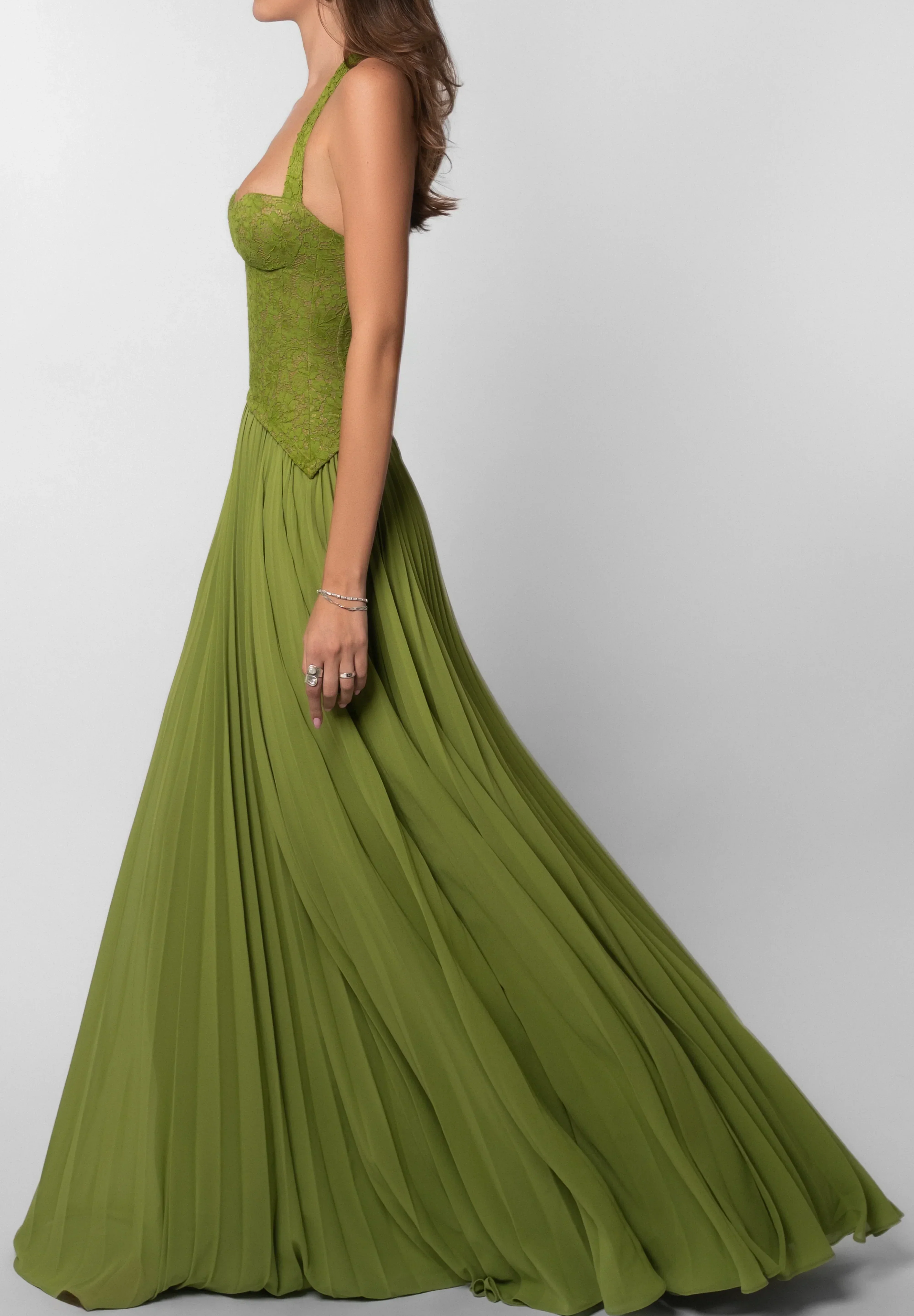 Groene feestjurk dames met corset en geplisseerde rok