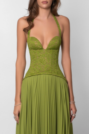Groene feestjurk dames met corset en geplisseerde rok