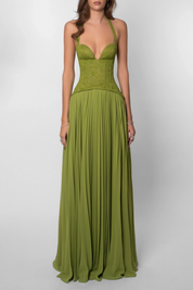 Groene feestjurk dames met corset en geplisseerde rok