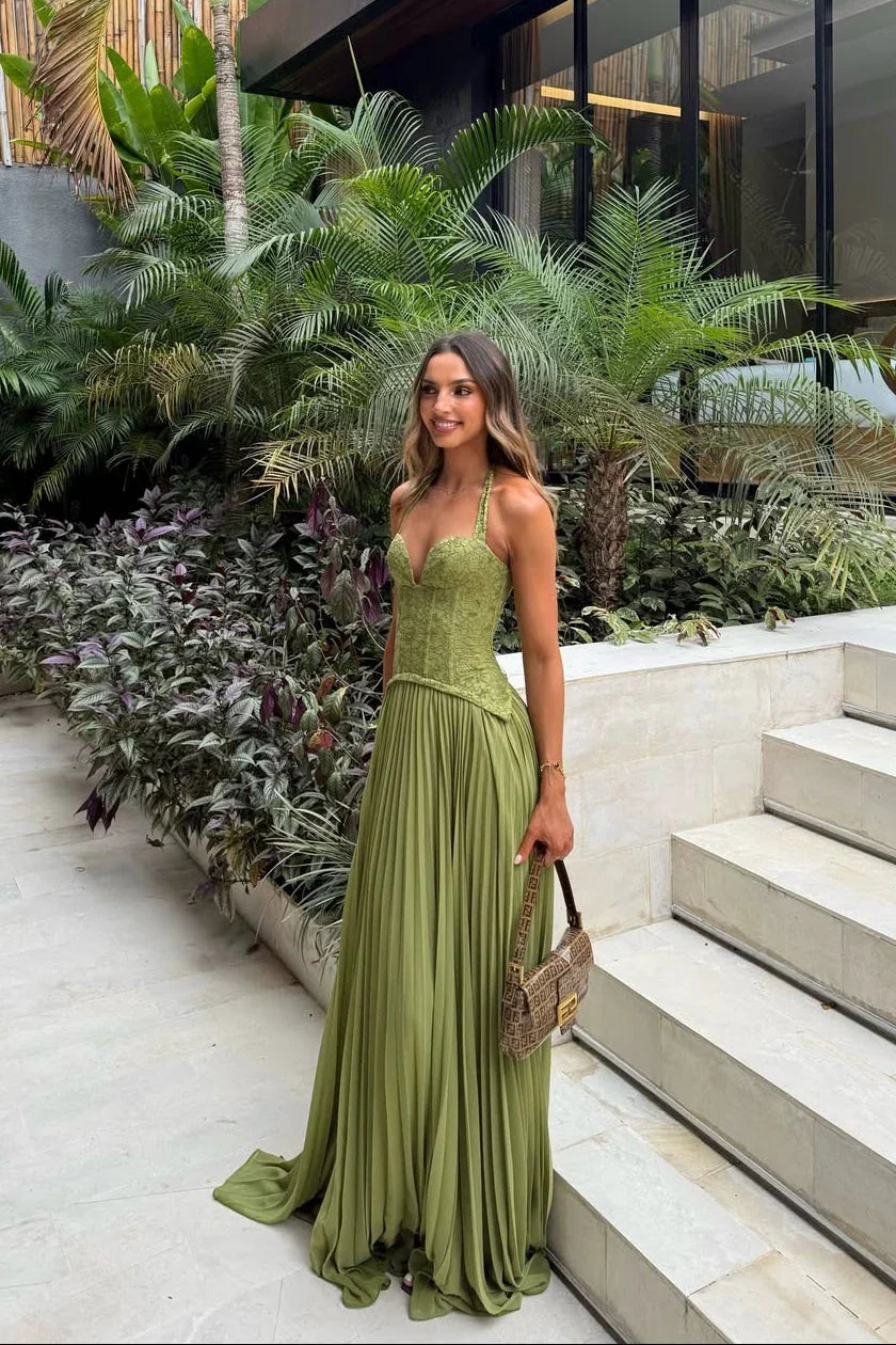 Groene feestjurk dames met corset en geplisseerde rok