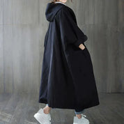 Dames jas | Oversized trenchcoat met capuchon en knoopsluiting