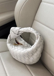 Geweven dames handtas | Stijlvolle pouch met knoop detail