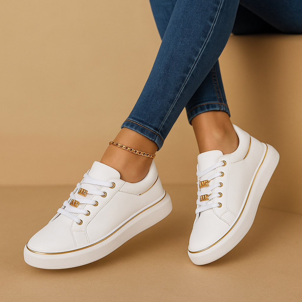 witte-sneakers-met-gouden-detail-voor-dames.png